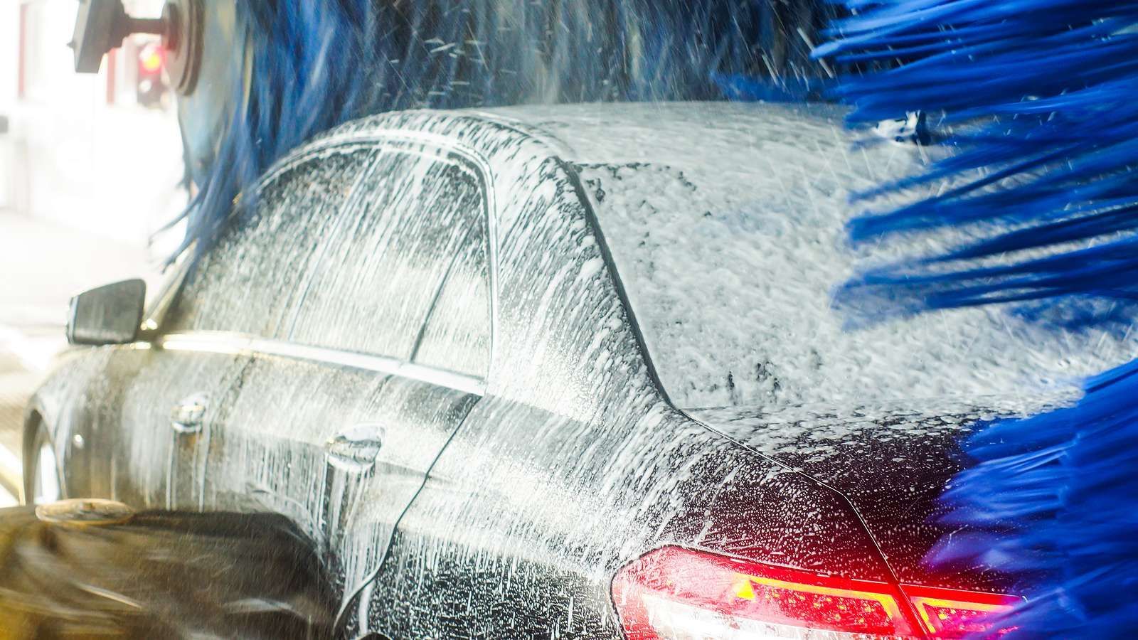 A car moving through the Northwest Auto Wash tunnel